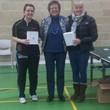 Tracy Dibble and Emily Standing receive their Ladies Doubles Winners trophies